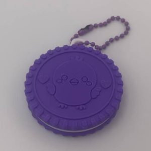 Cookie Chimin morada impresa en 3D con pajarito en relieve y cadena de llavero
